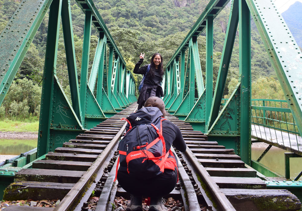 HIking to Machu pIcchu female travelers after rock climbing experience with peru climb