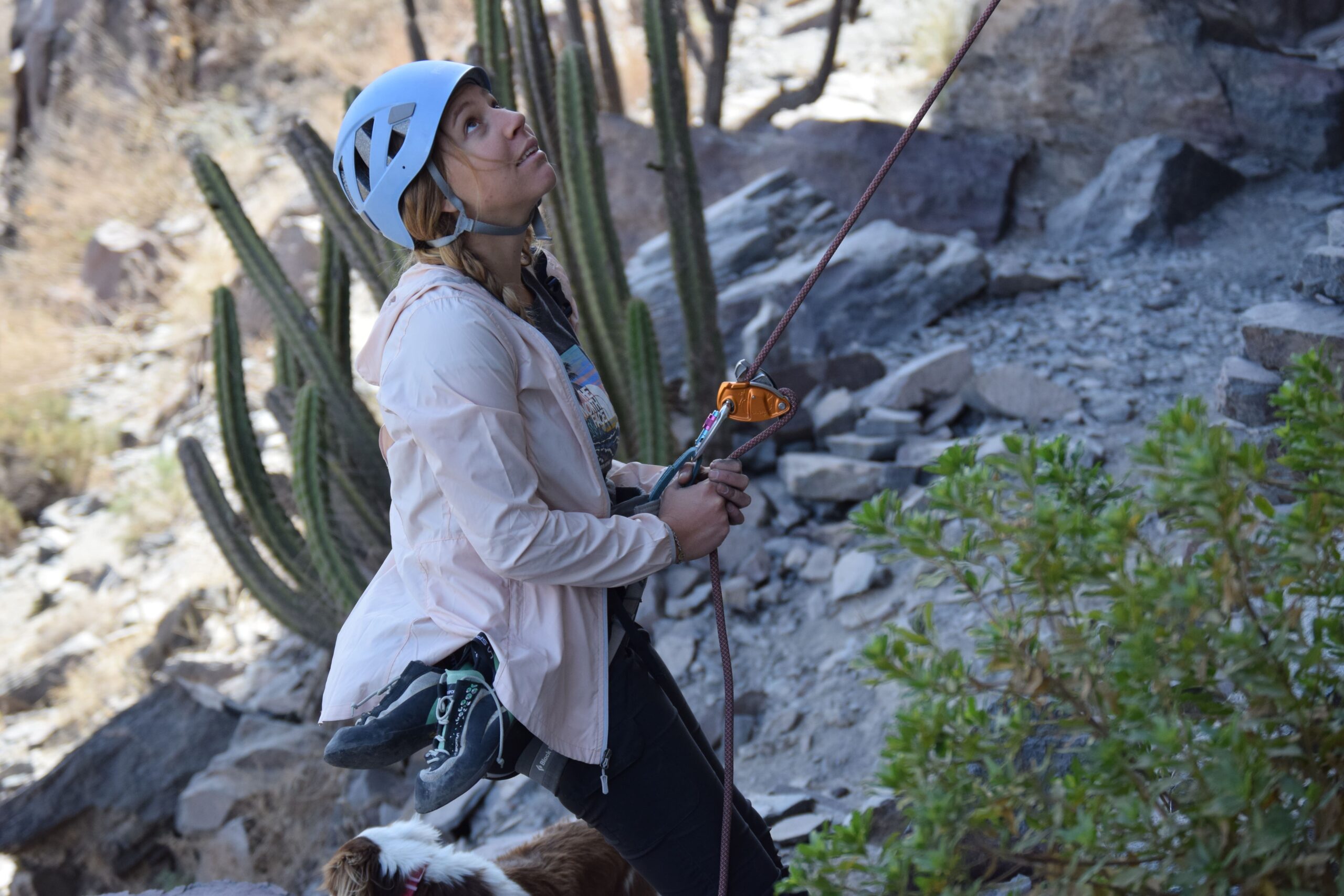 climber girl with rock climbing helmet grigri and equipment Chilina Valley Arequipa Peru with Climbing Rooftop boulder gym and rapel