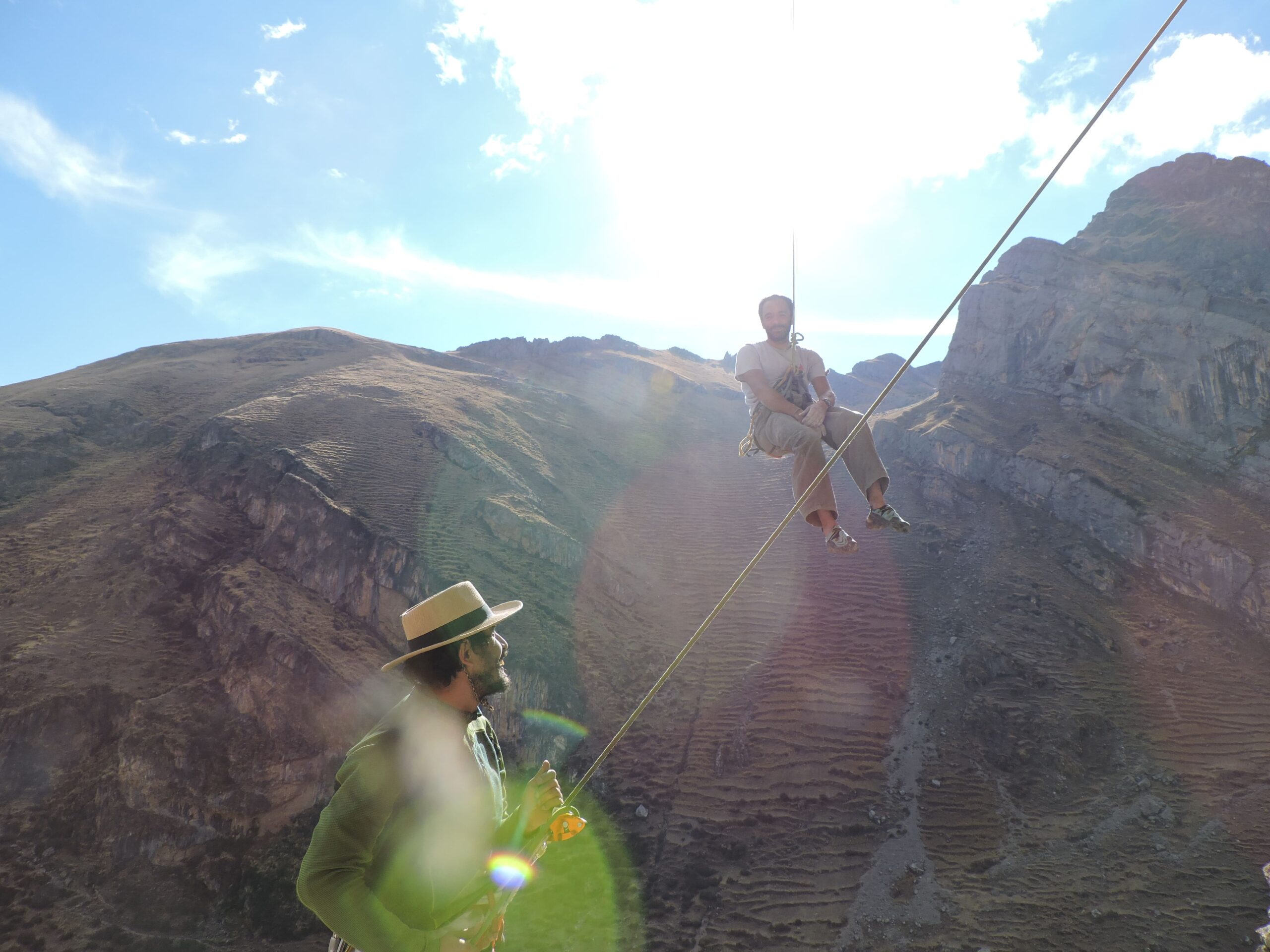 couple of climbers during sunset rock climbing tour with Alejandro Cornejo and Climbing Rooftop in Pitumarca Cusco Peru