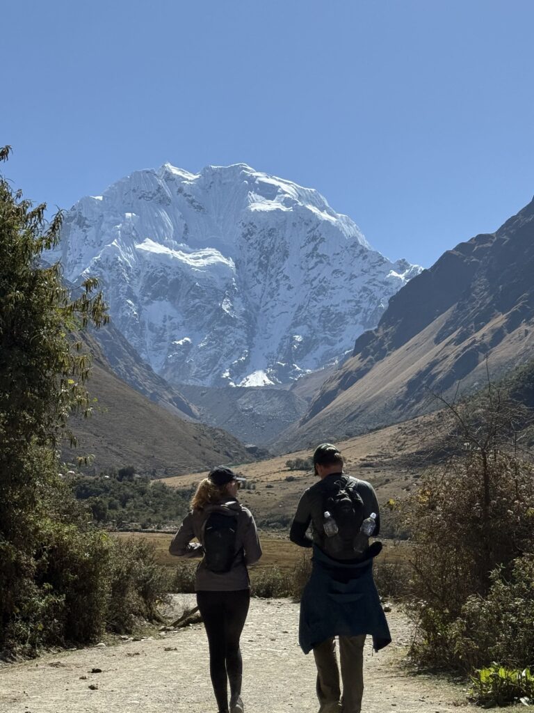 hikers and Salkantay snowy mountain during Salkantay trekking during Rock climbing tour to Macchu Picchu with Alejandro Cornejo offered by sky viajes and Peru climb
