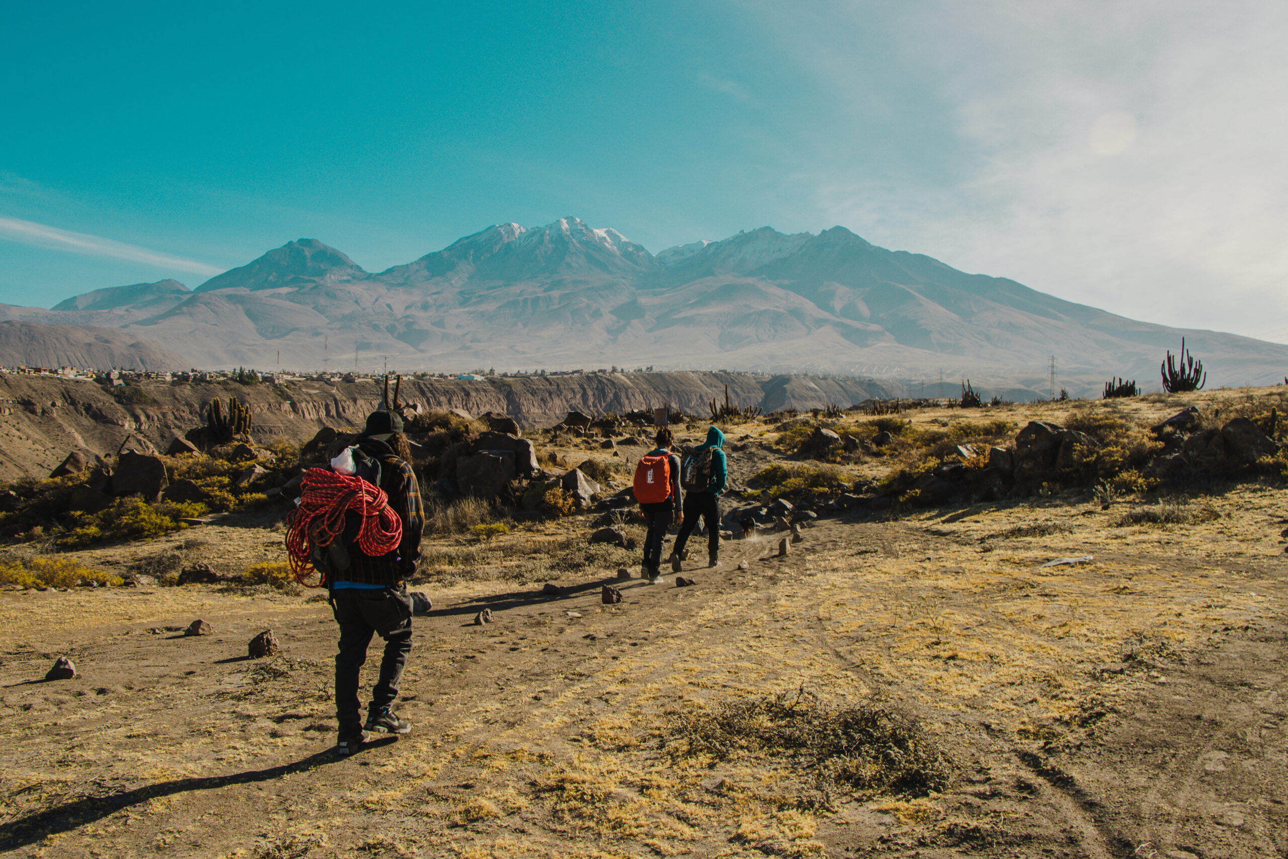 girl rock climbing with dog in Los Burros crag Chilina Valley Arequipa Peru with Climbing Rooftop boulder gym and rapel
