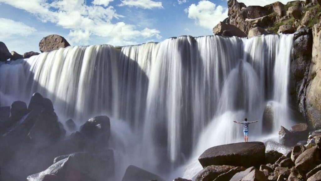 stunning waterfall Pillone during group climbing tour offered by Climbing rooftop and PeruClimb in Colca Canyon Coporaque Peru